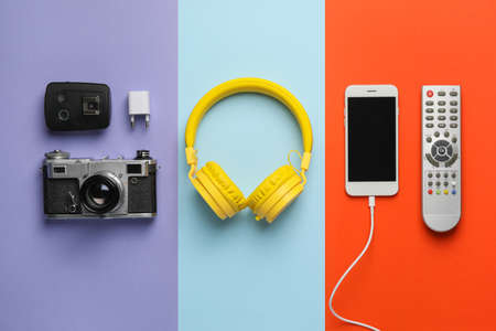 Different modern devices on color backgroundの写真素材