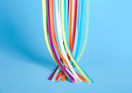 Colorful strips on blue background. Unity concept