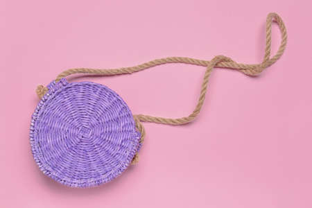 Wicker bag on color backgroundの写真素材