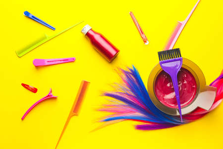 Supplies for hair coloring on color backgroundの写真素材