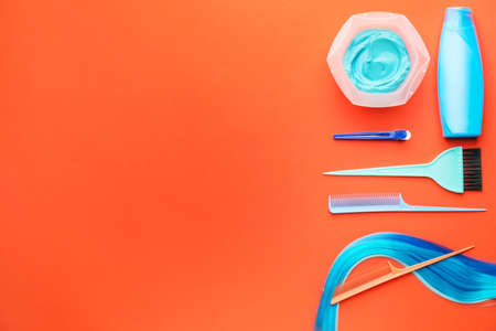 Supplies for hair coloring on color backgroundの写真素材