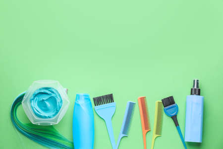 Supplies for hair coloring on color backgroundの写真素材