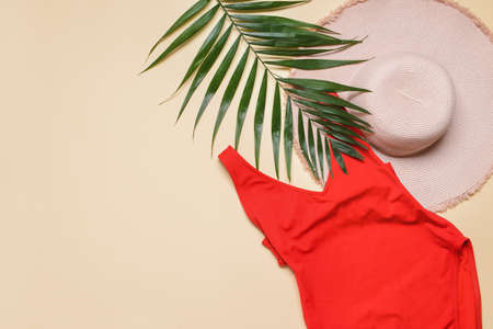 Straw hat with swimsuit on light backgroundの写真素材