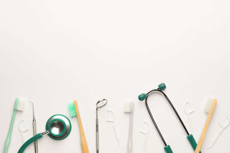 Set for oral hygiene with stethoscope on white backgroundの写真素材