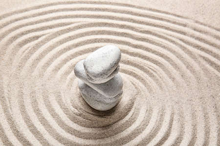 Stones on sand with lines. Zen conceptの写真素材