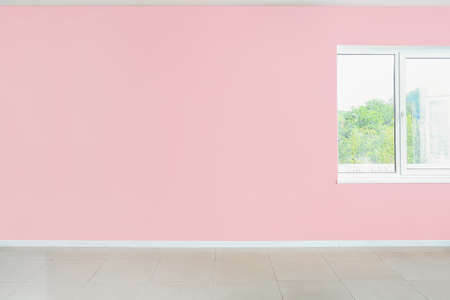 Color wall with window in empty room