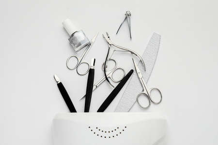 Supplies for manicure on white backgroundの写真素材