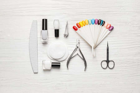 Supplies for manicure on white wooden backgroundの写真素材