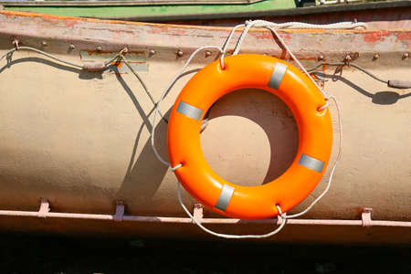 Boat with lifebuoy ring on berthの写真素材