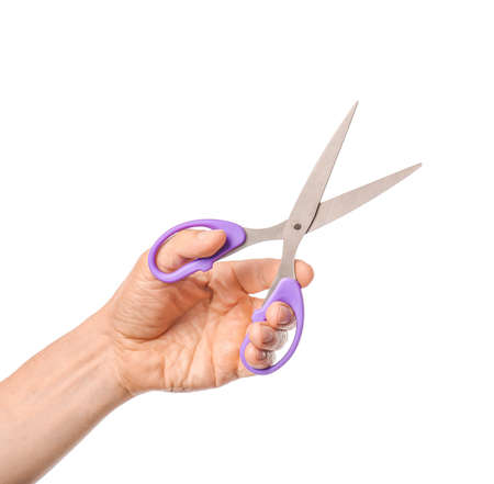 Male hand with scissors on white backgroundの写真素材