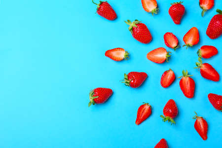 Sweet ripe strawberry on color backgroundの写真素材