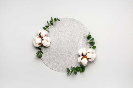 Composition with beautiful cotton flowers on light backgroundの写真素材