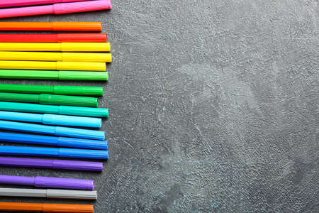 Colorful markers on gray backgroundの写真素材