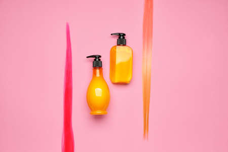 Cosmetics for hair treatment on color backgroundの写真素材