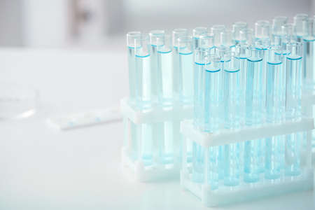Test tubes on table in laboratoryの写真素材