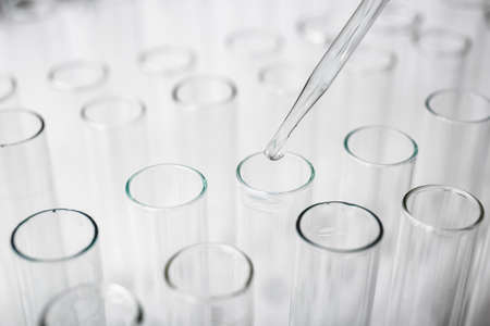 Many test tubes with dropper, closeupの写真素材