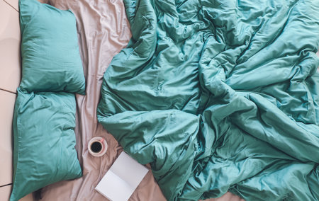 Big comfortable bed in room, top viewの写真素材