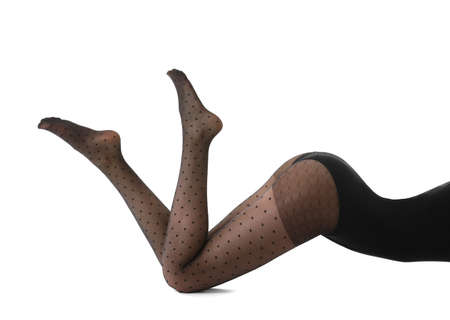 Beautiful young woman in tights on white backgroundの写真素材