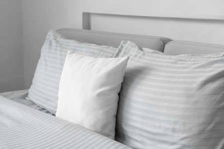 Big comfortable bed in roomの写真素材