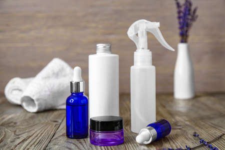 Cosmetics for hair on wooden table