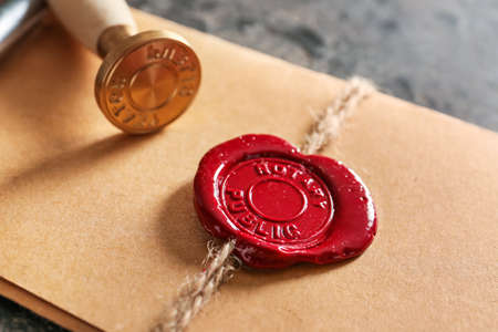 Envelope with wax seal stamp of notary public, closeupの写真素材
