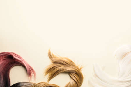 Female wigs on light backgroundの写真素材