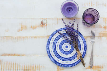 Beautiful table setting on wooden backgroundの写真素材