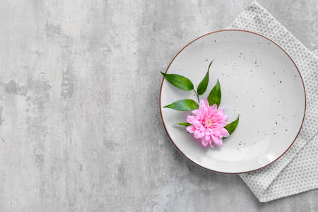 Beautiful table setting on gray backgroundの写真素材