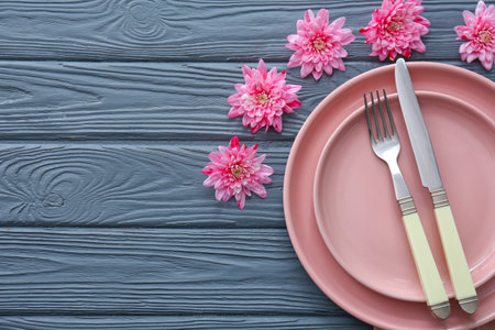 Beautiful table setting on wooden backgroundの写真素材