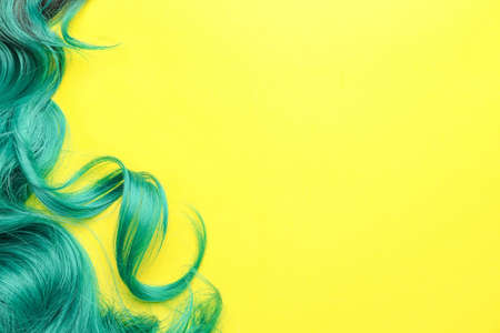 Unusual wig on color backgroundの写真素材