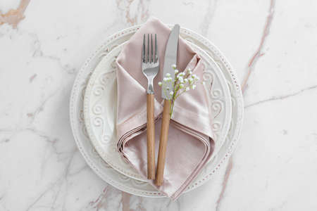 Beautiful table setting on light background