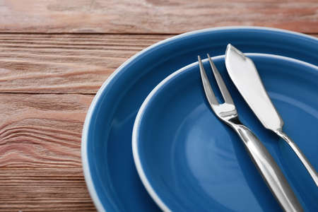 Simple table setting on wooden background, closeupの写真素材