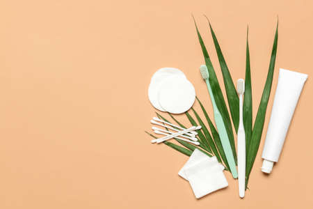 Toothpaste with supplies on color backgroundの写真素材