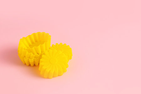 Muffin baking cups on color backgroundの写真素材