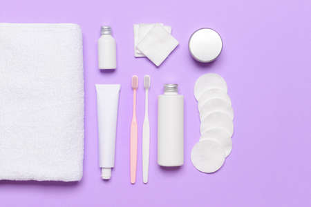 Cosmetics with supplies on color background