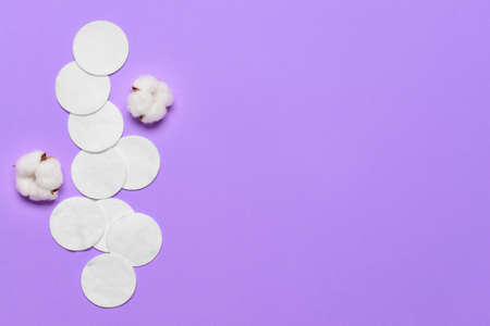 Cotton cosmetic pads on color backgroundの写真素材