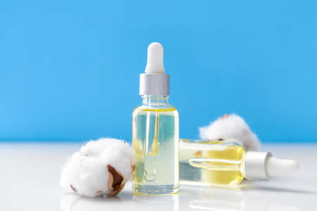 Bottles of cottonseed oil on tableの写真素材