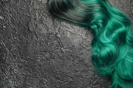 Unusual wig on dark backgroundの写真素材