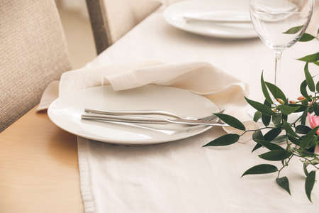 Beautiful table setting in restaurantの写真素材