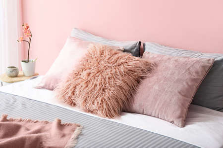 Big comfortable bed in roomの写真素材