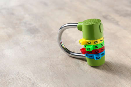Small lock on gray background