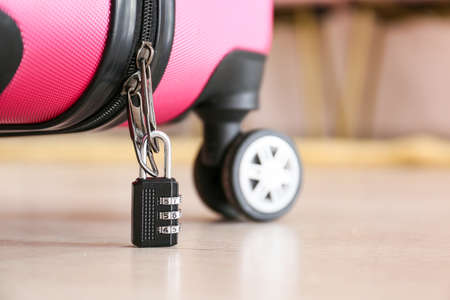 Suitcase with lock in room, closeupの写真素材