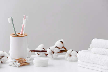 Cotton flowers with supplies on tableの写真素材