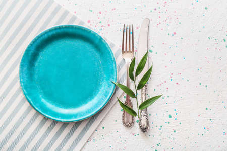 Simple table setting on white backgroundの写真素材