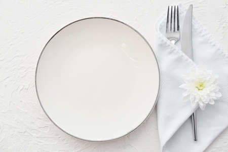 Simple table setting on white backgroundの写真素材
