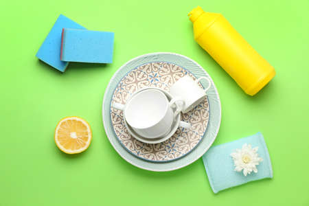 Composition with clean dishes on color backgroundの写真素材