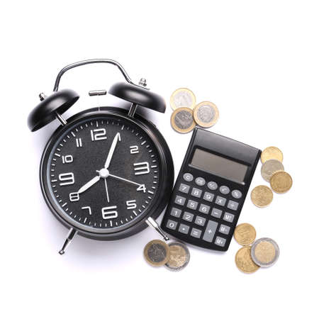 Alarm clock with calculator and money on white background