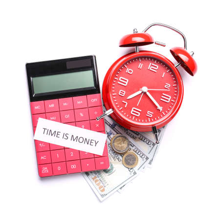 Alarm clock with calculator and money on white backgroundの写真素材