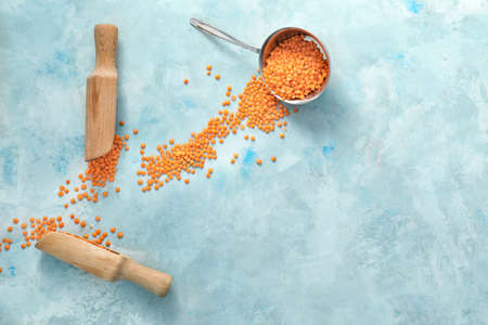 Composition with red lentils on tableの写真素材