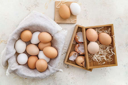 Fresh chicken eggs on table